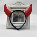 Detailed front view of red devil horns headband with soft plush texture for parties - Red Horn Black Headband