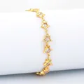 Golden star bracelet with sparkling zircon stones set against a clean white background - Style 1-Star Zircon Bracelet