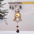 Wooden Christmas bell pendant with glowing snowman design and pine cone accent - Bell Snowman