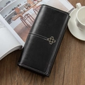 Long black faux leather wallet for women with golden floral accent and white stitching - Black