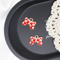 Coppia di ciondoli a fiocco smaltati a pois rossi con bordo dorato per gioielli - 17.5*14mm / Rosso