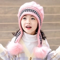 Pink knit hat for girls with ear flaps and large pom-poms for winter warmth - Pink
