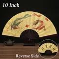 Classic 10-inch yellow folding fan with traditional dragon and phoenix pattern design - 10-Inch Dragon and Phoenix