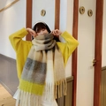 Close-up of thick checkered rainbow scarf featuring soft yellow fringe and knit texture - No.17 Yellow Grey Plaid