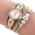 Elegant dames wikkelhorloge met kristallen en kralenarmband in een gouden afwerking - Beige