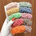 Colorful plush faux fur BB hair clips set in vibrant shades on a display card - Woolen Round Mixed Colors