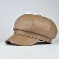 Detailed view of brown PU leather newsboy hat with stitched panels and top button - Adjustable / Khaki