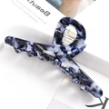 Detail of large claw clip featuring blue and white marble acetate texture and sturdy spring - S137-11 Blue & White Marble