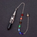 Detailed macro view of black hexagonal crystal pendulum with seven chakra colored beads - Black Agate With 7 Chakras Bead Chain