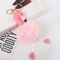 Detailed shot of pink flamingo faux fur pompom keychain with golden metal clasp - Pink - Gold Lobster Clasp