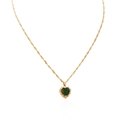Close-up of golden heart necklace with deep green gemstone and cubic zirconia pavé details - Green