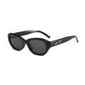 Klassische schwarze Cateye Sonnenbrille mit silbernen Metallakzenten und UV-Schutzgläsern - Schwarzer Rahmen Graue Gläser
