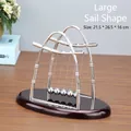 Large sail-shaped Newton cradle balance balls with red wood base, size 21.5x26.5x16cm - Large Sail-shape