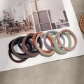 Elastic hair ties in various colors like navy, brown, and khaki on a magazine page - 10 Pcs/Set / Morandi Colors
