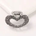 Detail of silver alloy heart hair claw with textured hammer finish and metal spring - Heart - Antique Silver