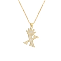 Macro shot of gold-plated crown letter X pendant necklace with sparkling cubic zirconia - Crown Letter X(X)