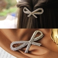 Sparkling rhinestone bow hair clip with white pearls on a gold finish metal base - Silver Graceful Bow Spring Clip