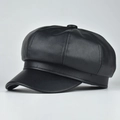 Detailed view of black PU leather baker boy hat with fine lychee grain texture - Adjustable / Black