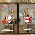 Christmas window sticker featuring Santa with colorful balloons and snowman designs - Balloon Santa and Snowman Combo (HYC-061) / 50x70cm