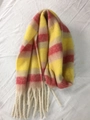 Close-up of soft winter scarf featuring yellow and red stripes with white fringe details - Yellow Red Beige Striped (1)