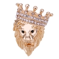 Macro detail of a golden lion head brooch with sparkling rhinestone crown decoration - Gold