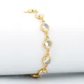 Chic gold plated chain bracelet with star and cubic zirconia pavé stones in white background - Style 2-Round Prong Set Bracelet