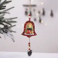 Red wooden Christmas bell ornament featuring a reindeer and cabin scene with pinecone detail - Bell House