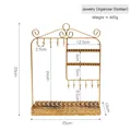 Golden creative branch jewelry display stand with earring holes and floral base tray - Golden Tray Jewelry Rack