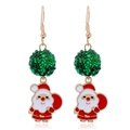 Festive Christmas drop earrings featuring green sequin balls and Santa Claus charms - Santa Claus