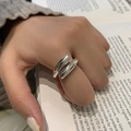 Modern silver open ring with geometric irregular wide band on model's hand - Adjustable Open / Irregular Geometric Wide Band Style (JZ8948)