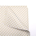 Semi-transparent white tissue paper featuring metallic gold polka dots for gift wrapping - Gold Polka Dots