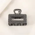 Detail of gunmetal alloy hair claw clip with embossed rose floral pattern textures - Rectangle - Gun Black