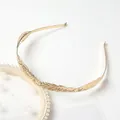 Detail of golden laurel leaf headband with intricate metal textures and Greek vintage style - Gold Two-Leaf Headband