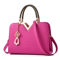 Rose red handbag with triangle embossing, woven handle, and decorative pearl charm - Rose Red