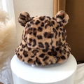 Close-up of leopard print plush bucket hat with cute bear ears on a white stand - One Size / Leopard Print