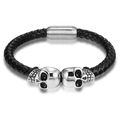 Pulsera para hombre de cuero trenzado negro con calaveras plateadas y cierre magnético - 19cm / Color Acero