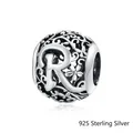 S925 sterling silver hollow sphere charm bead with letter R and floral vine patterns - 925 Silver / Letter R