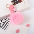 Detail of pink faux fur flamingo keychain with gold lobster clasp on white books - Deep Pink - Gold Lobster Clasp