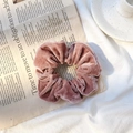 Velvet scrunchie in dusty rose pink finish with a soft glossy texture and pleated design - Lotus root pink