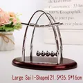 Large sailboat-shaped Newton's cradle balance balls with reddish brown base, 21.5x26.5x16cm - Large / Sailboat Shape