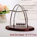 Newton's Cradle desk toy in sailboat shape with red base, small size 13x17.5x11cm - Small / Sailboat Shape