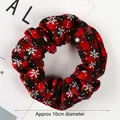 Close-up of red and black checkered scrunchie with white snowflake patterns and 10cm diameter - Red Black Plaid Snowflake Print