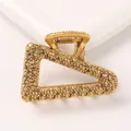 Detail of a vintage gold triangle metal hair claw clip with hammered texture finish - Triangle - Antique Gold