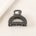 Macro detail of alloy hair claw clip featuring intricate rose floral relief and metallic finish - Semicircle - Gun Black