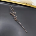 Elegant gold-tone ear crawler earring featuring a minimalist 'love' script design - LOVE Style Gold
