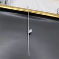Silver crawler earrings with long bar and marquise zircon on black leather tray - Single Leaf Silver