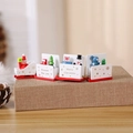 Wooden Christmas train ornament with Santa and snowman figures on a decorative red base - Sleigh 4-Section Train / White