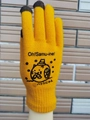 Yellow knit touchscreen gloves featuring a black cartoon cat and decorative typography - Clearance Stock
