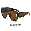 Lunettes de soleil C11 surdimensionnées, monture noire, verres thé et détails dorés - Monture Noire Verres Thé