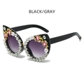 Occhiali da sole cat-eye neri con lenti viola sfumate e accenti floreali in strass - Nero / Lenti Grigie